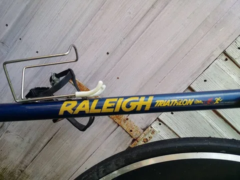 Down tube transfer reading Raleigh Triathlon, with swim, bike and run figures