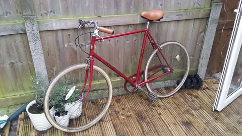 Side view of the red Hercules on decking